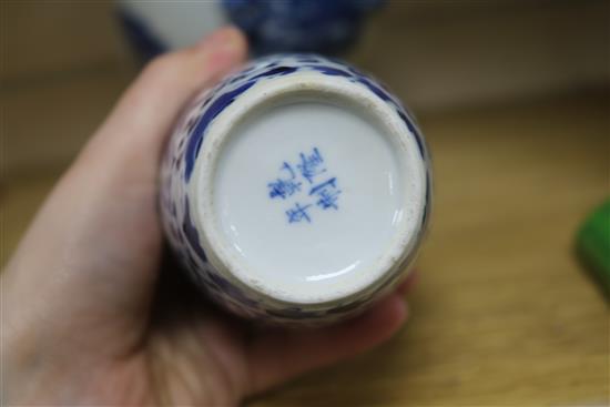 A Chinese blue and white bowl, liner and cover and three vases